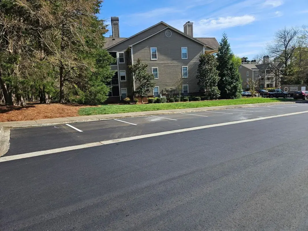 Newly paved multi-unit property parking lot