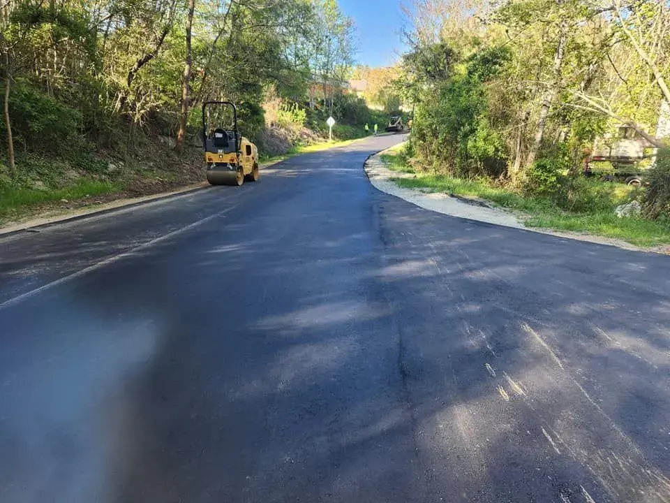 Roller finishing a new asphalt surface