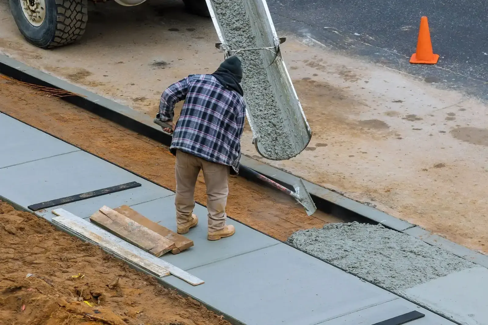 Crew pouring a concrete walkway for a commercial property