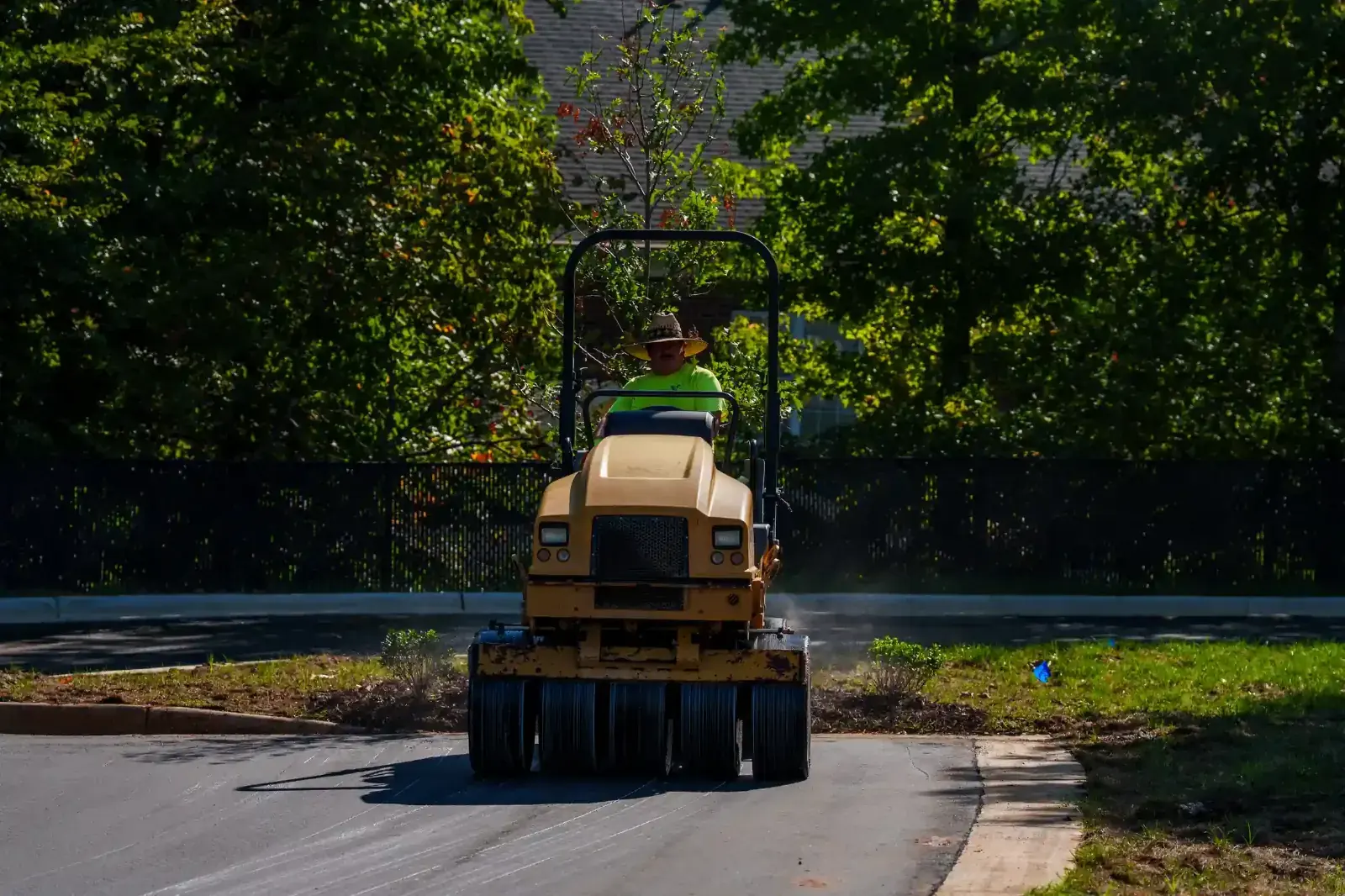 Roller compacting a fresh asphalt overlay